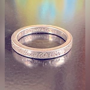 WOW POSHMARK - 
Authentic Tiffany & Co. Sterling Silver stacking ring.